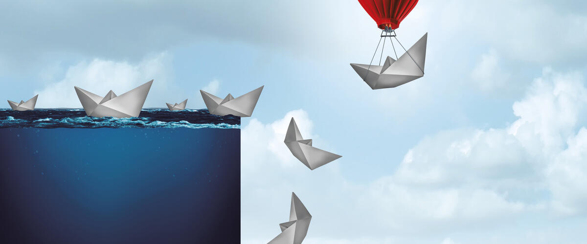 Schiffe drohen abzustürzen, ein Schiff hebt mit einem Ballon ab.